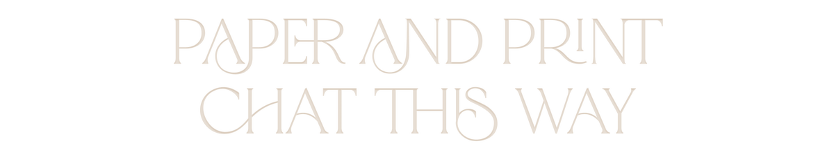 Paper and Print Chat This Way sign in pale lettering on a black background